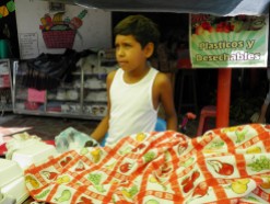 young man selling lechona in Tolima