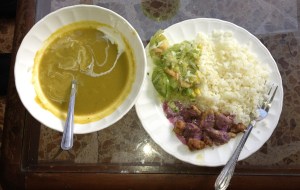 creme of vegetable soup, pork with grape sauce, green salad and rice